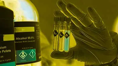 Chemicals in test tubes and symbols used in laboratory or industry